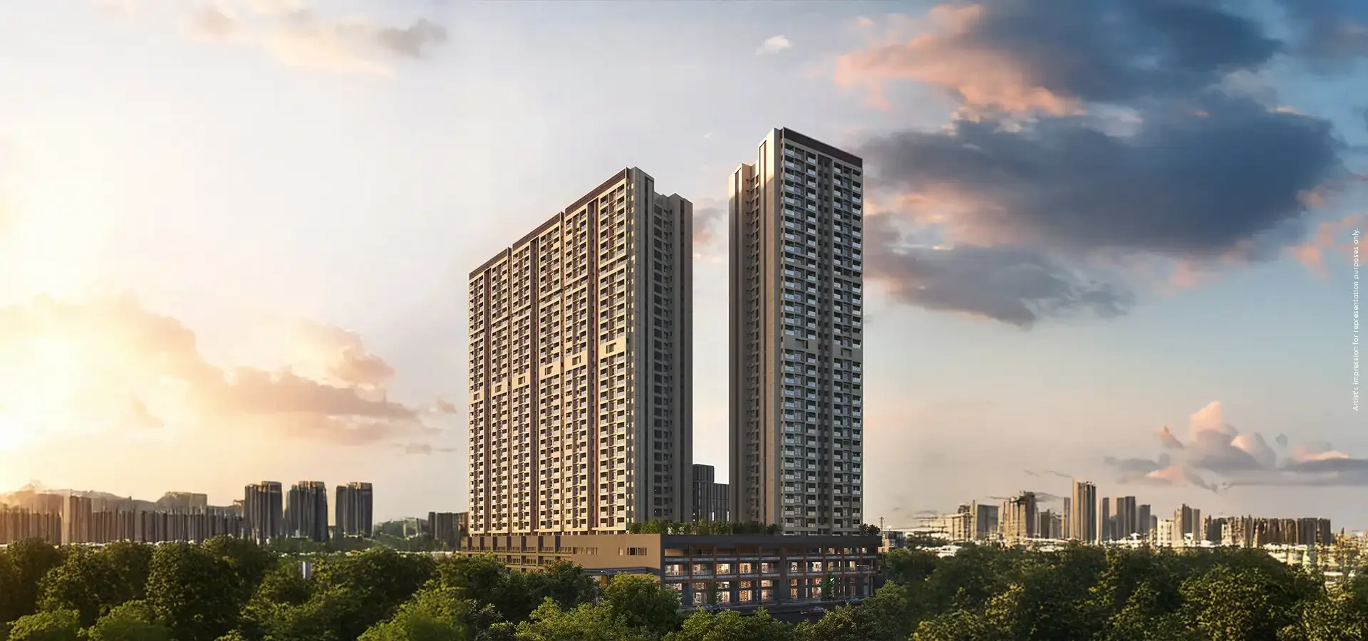 Godrej Elaris twin towers against an evening sky with the Pune skyline behind