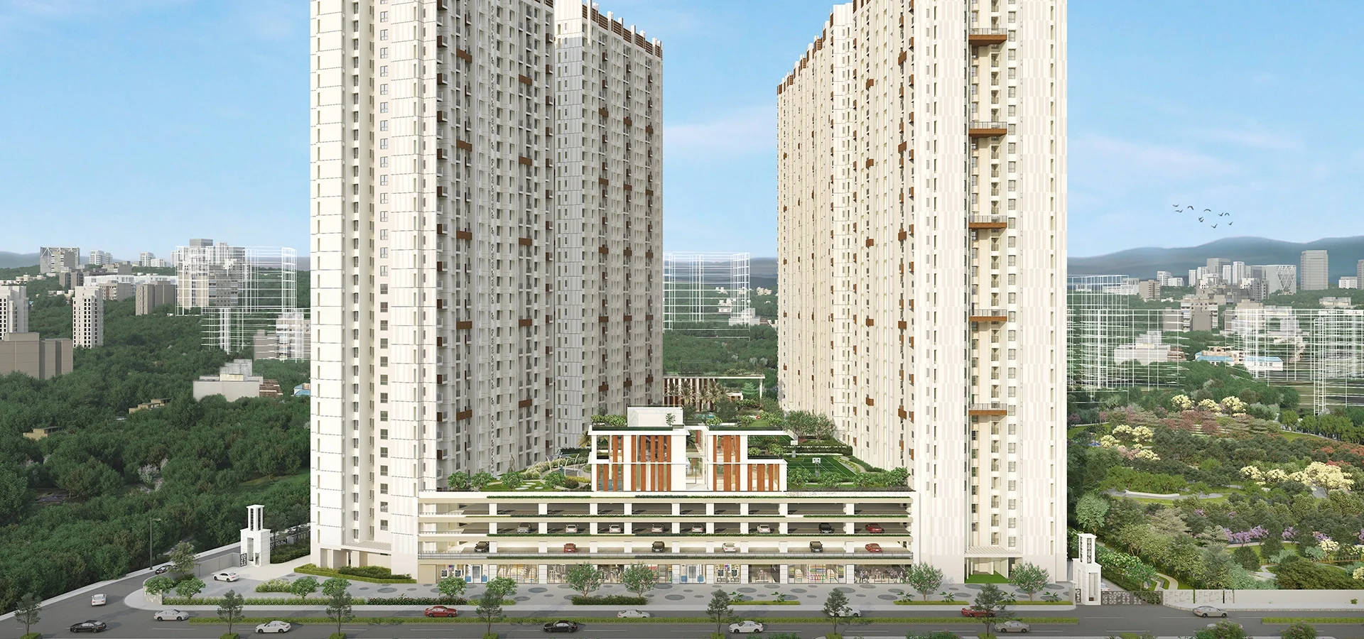 Godrej Meadows tower elevation from the approach road with the hills behind