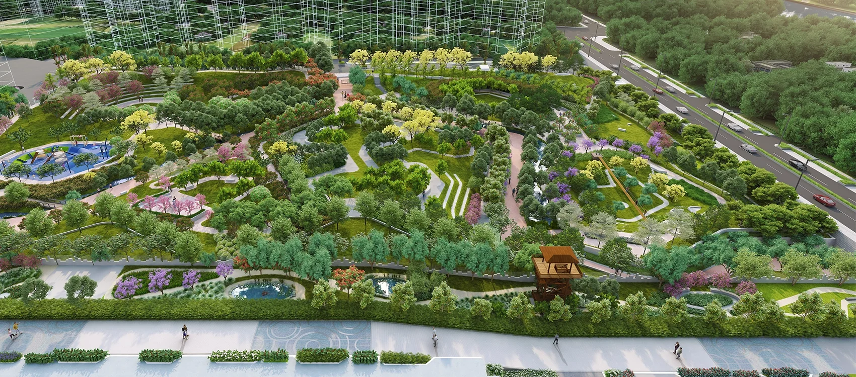 Godrej Meadows aerial view of the landscaped park and walking trails alongside the road