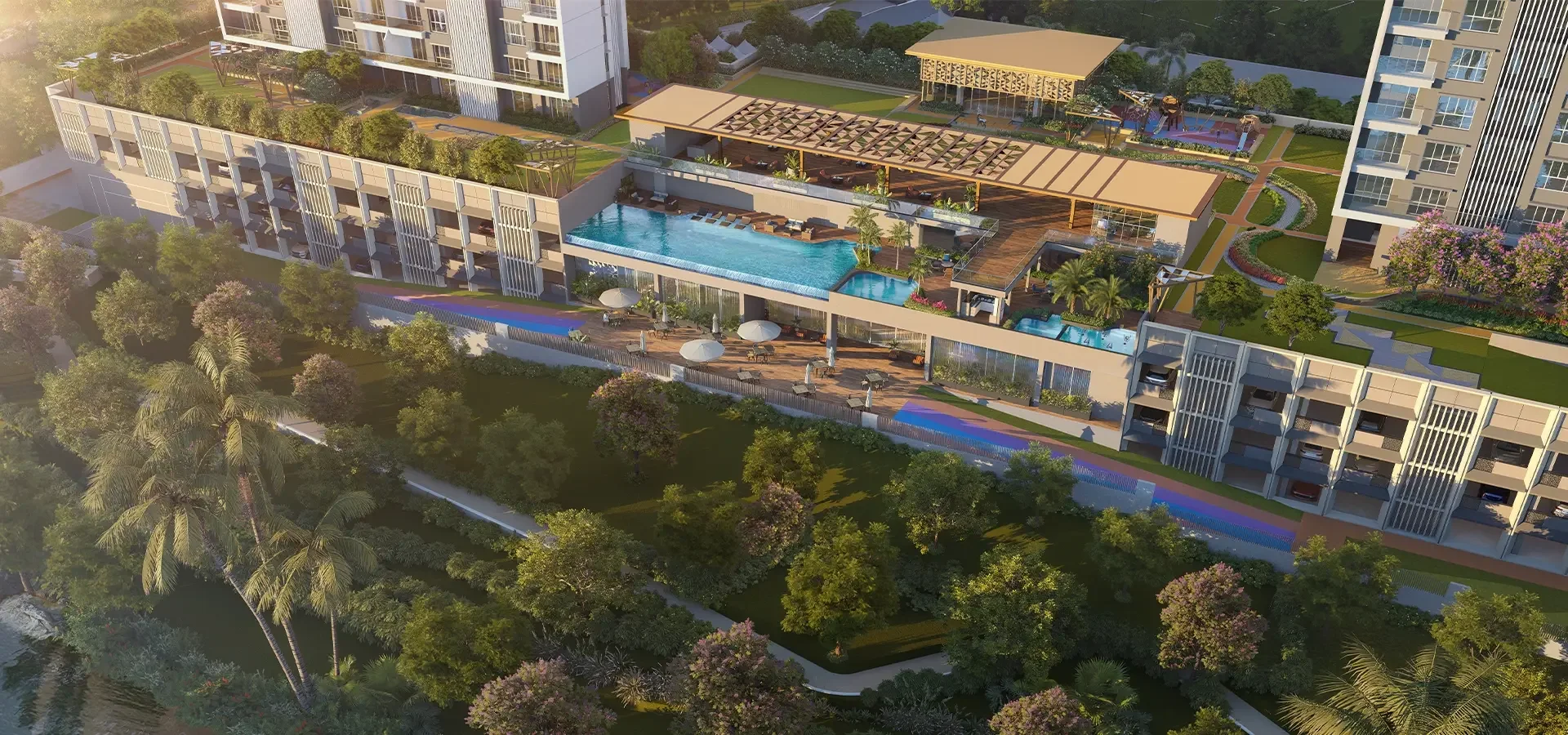 Godrej River Royale aerial view of the pool deck and riverside clubhouse