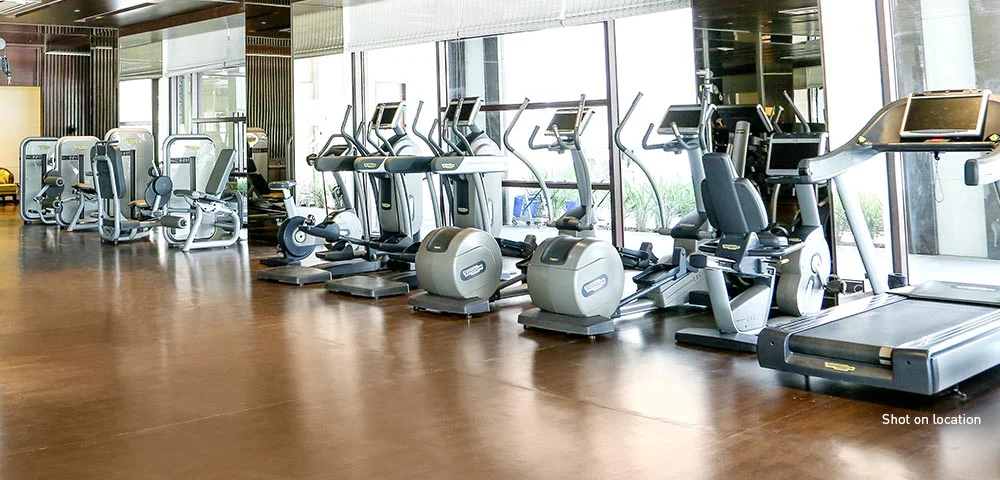 Lodha Belmondo fully equipped gymnasium overlooking the greens