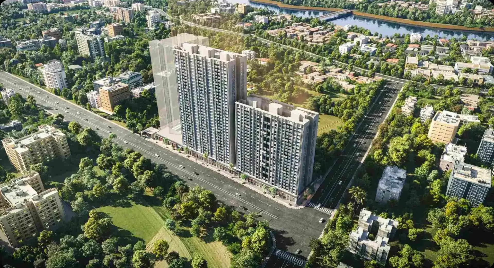 Mantra Magnus aerial view showing the towers against the river and surrounding greenery