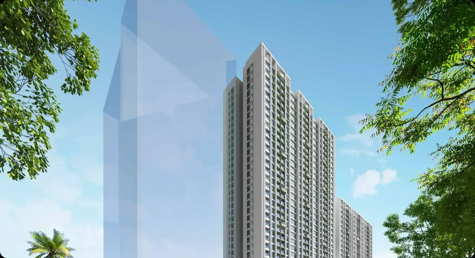 Mantra Magnus tower facade framed by trees against open sky