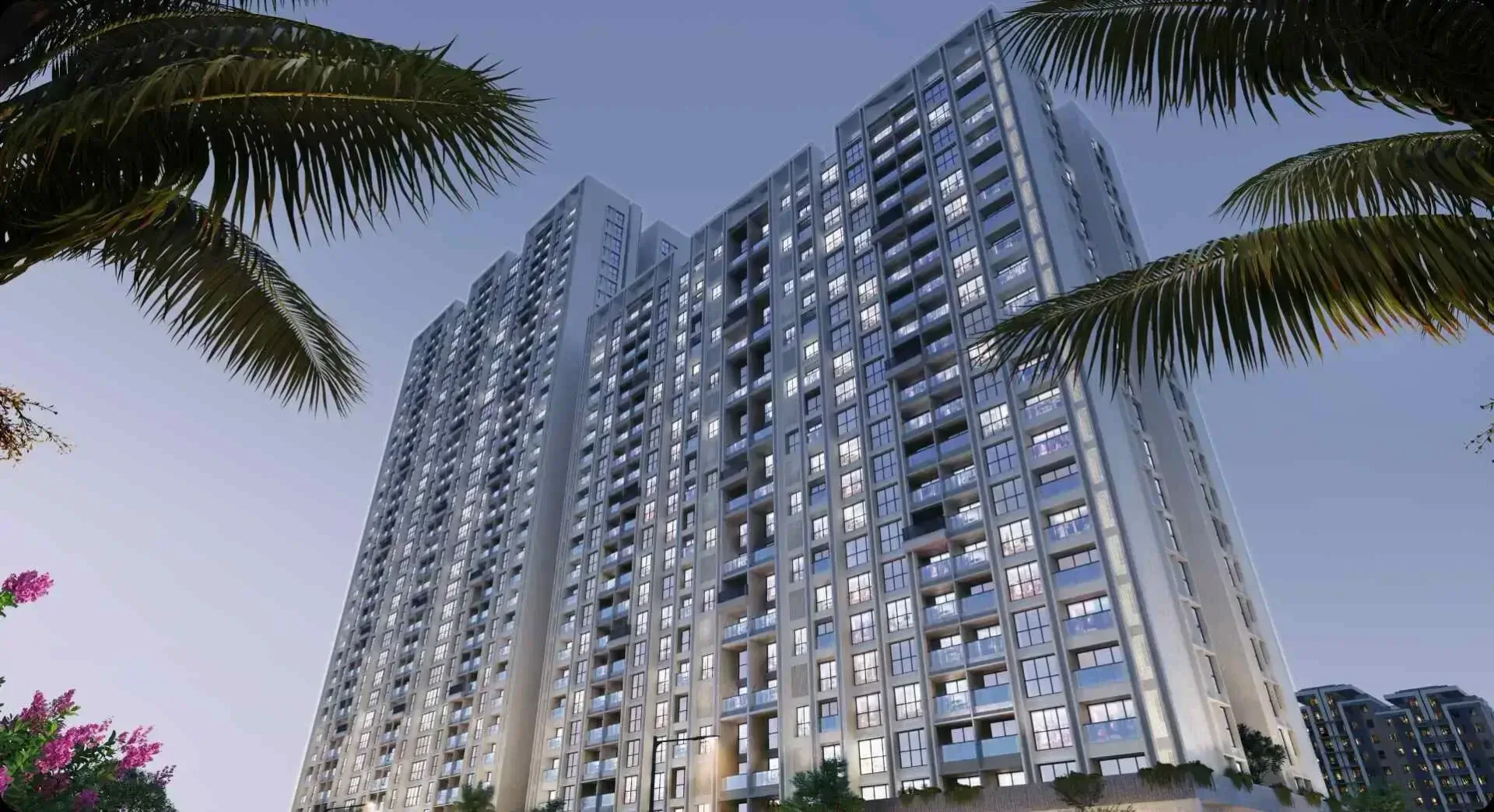 Mantra Magnus tower elevation seen from the base looking up past palm planting