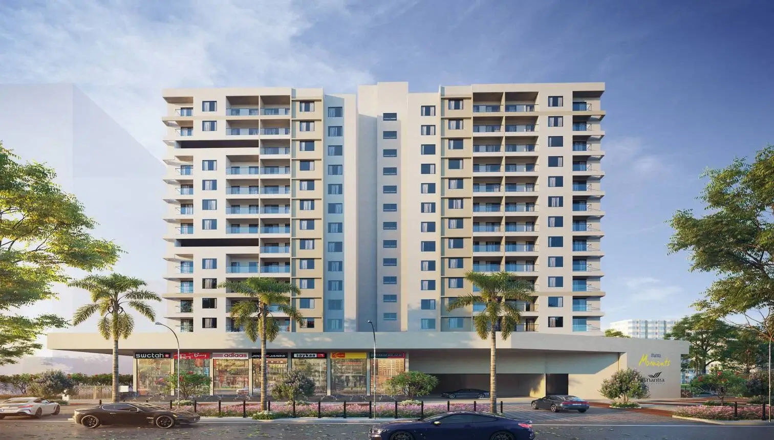 Mantra Moments tower facade with landscaped forecourt and parking