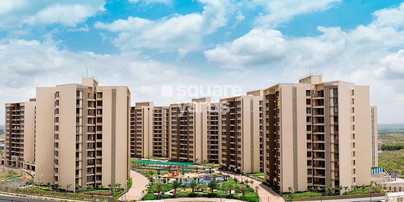 Pride World City aerial view showing multiple residential towers in Charholi Budruk