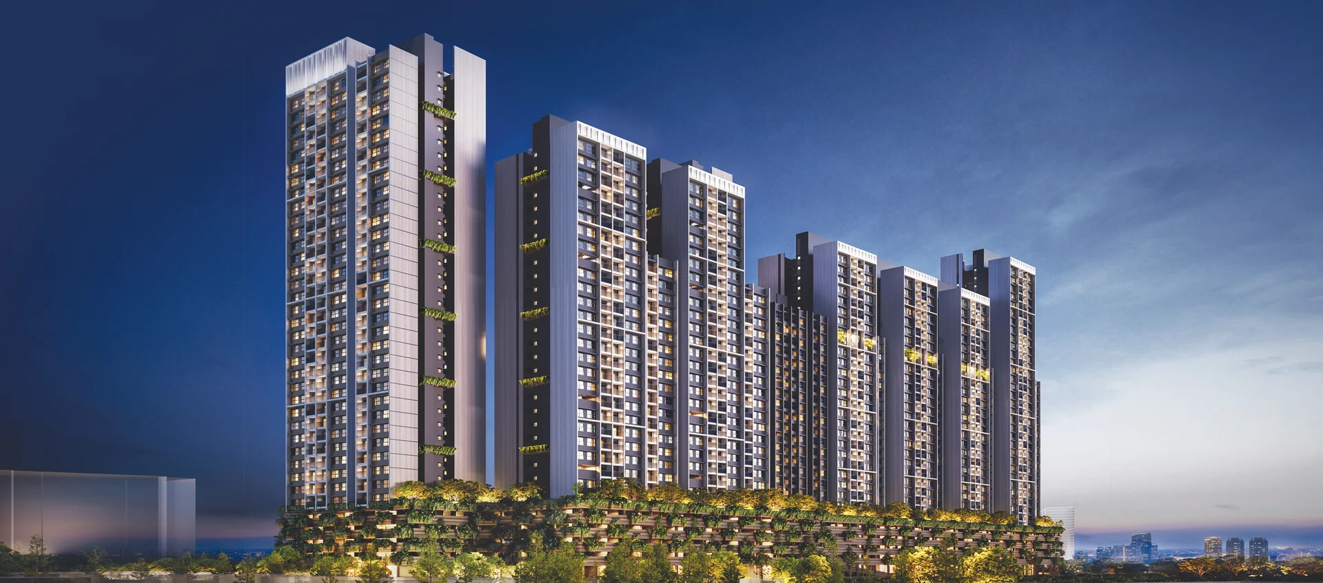Rohan Harita evening elevation with illuminated podium landscaping
