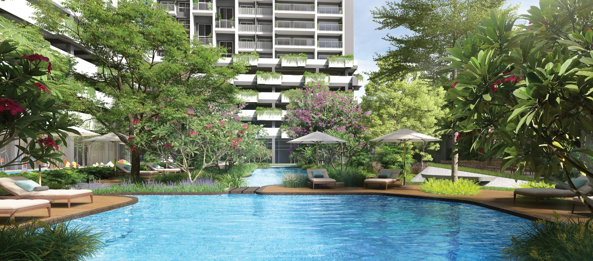 Rohan Harita pool lounge deck with cabanas and dense tree planting