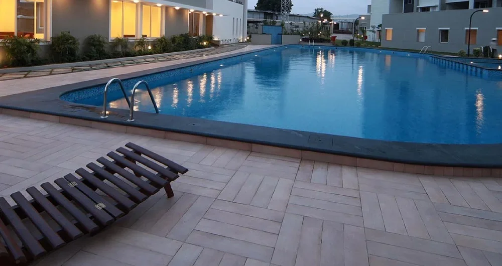 Sobha Orion swimming pool and deck at dusk